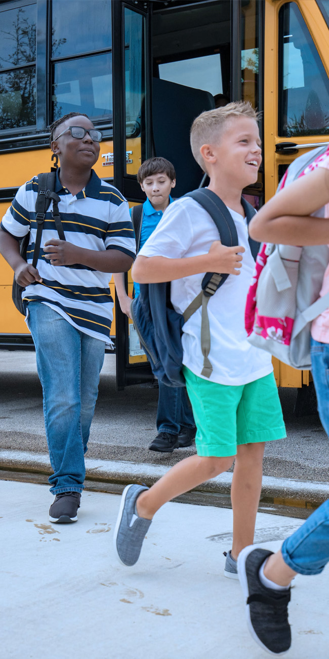 Keeping People Safe, Happy safe children with school bus