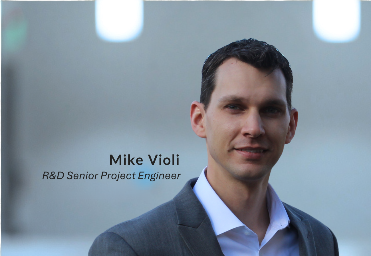 Headshot of Mike Violi, smiling at the camera, featured in an employee testimonial image.